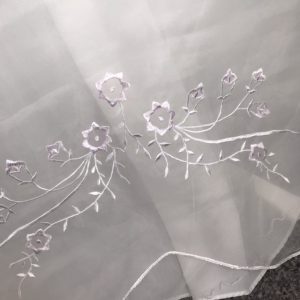 Embroidery detail on Anemone wedding dress skirt