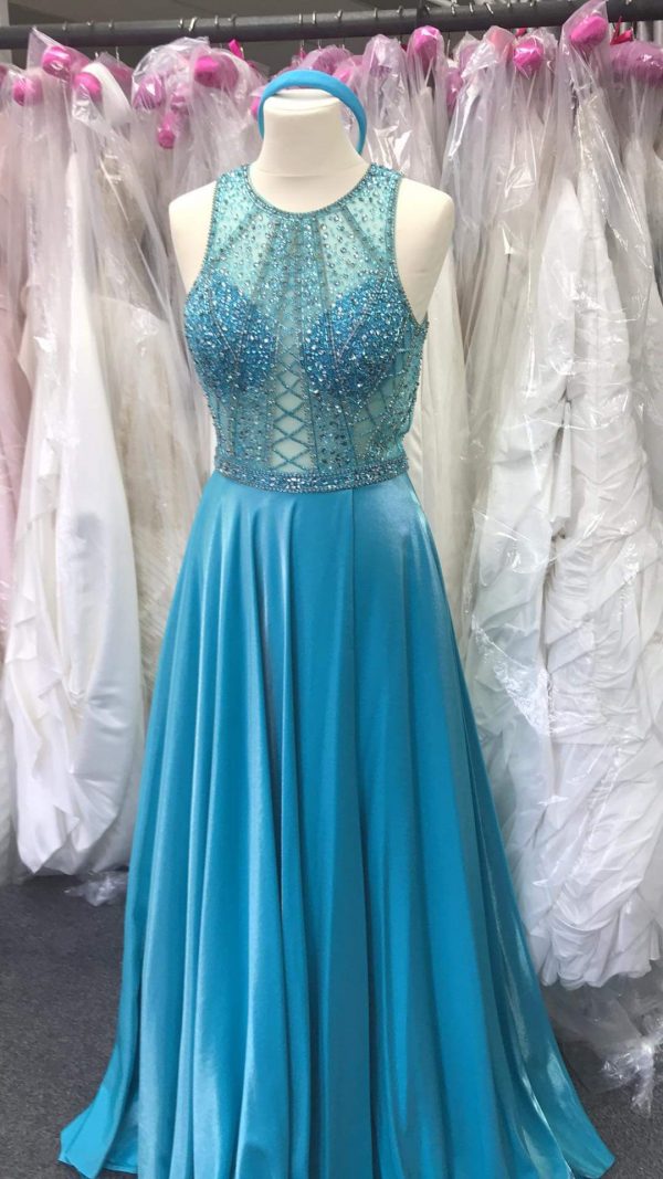 Afton is a prom dress with a beaded top in turquoise