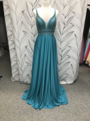 Image of the Michaela prom dress in turquoise on a mannequin showing front details